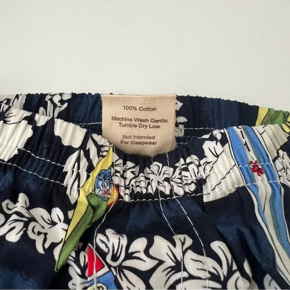 Giggle Surf navy blue Hawaiian floral surfboard print cotton shorts